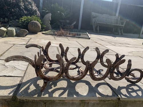 Hand crafted horseshoe - hand,