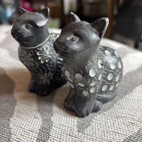 Hand carved soapstone also - hand-carved,