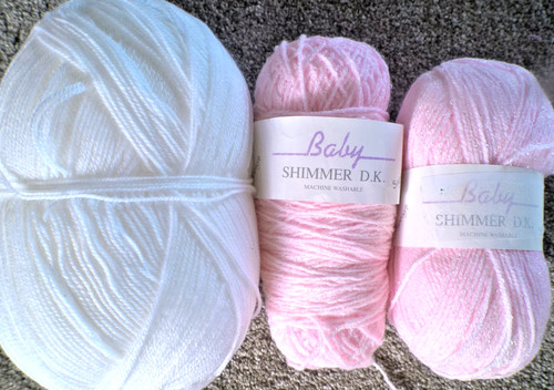 Pink and white coloured baby - and,
