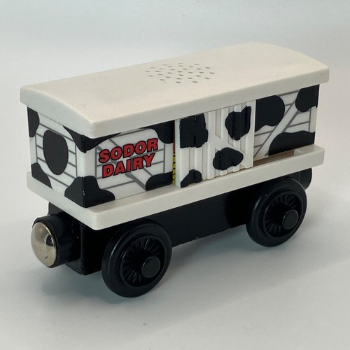 Wooden railway mooing - wooden, cow