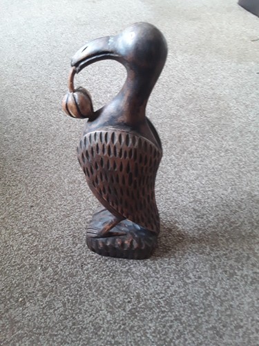 Hand carved bird from hard