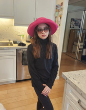 Womens beautiful pink hat worn