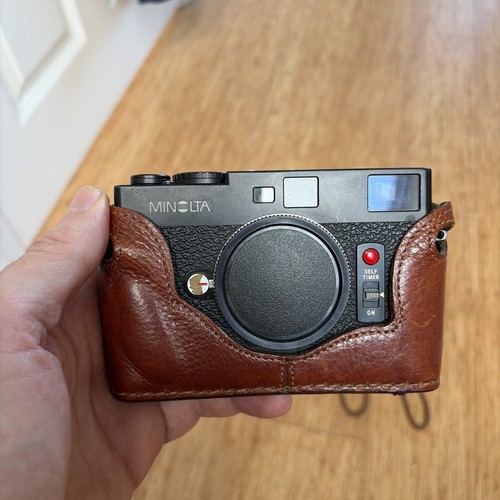 Minolta cle rangefinder - cle, takes