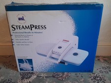 Steam Press professional portable iron. Gives great results fast.