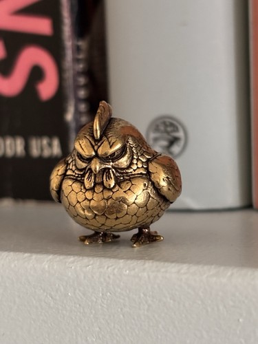 Small brass spherical angry - small,