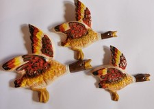 Flying ducks plaster wall