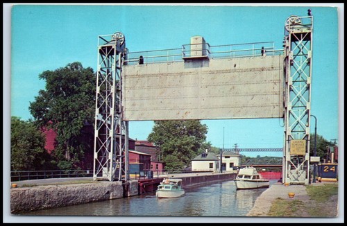 Postcard boats leaving barge - postcard,