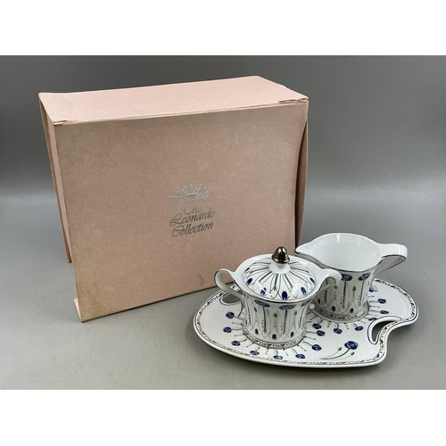 Boxed mackintosh style - mackintosh, three