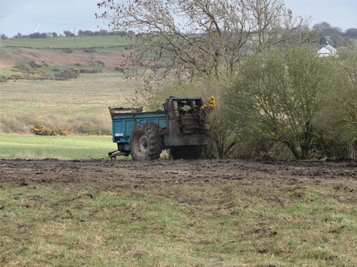 Photo muck spreader near - muck,