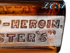ORIGINAL antique HEROIN bottle embossed w/ FULL LABEL unique and RARE patent med