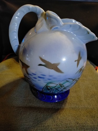 1938 falcon ware shaped jug - a,