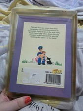 vintage postman pat book and