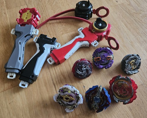 Beyblade bundle with launchers - beyblade,