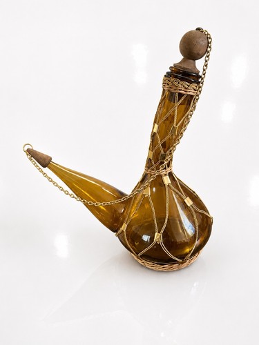 Vintage amber glass genie - amber,