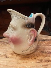 Advertising face whisky jug