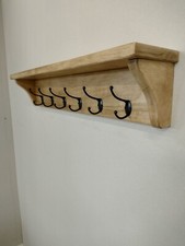 Rustic wooden coat rack, with