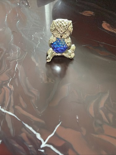 Exquisite owl sitting a - on,
