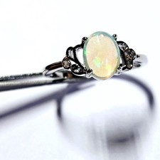 Solid Opal Oval Ring Flourish