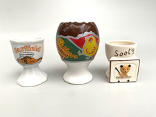 3x Vintage Novelty Ceramic Egg Cups - Cadbury's Cream Egg - Sooty - Garfield