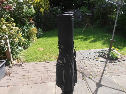 Bag boy golfing - "bag, travel/