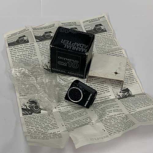 Boxed olympus om10 - **boxed**,