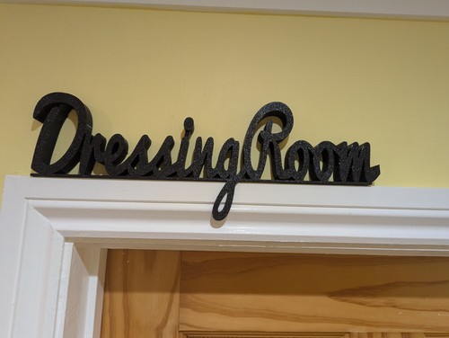 Dressing room door sign - door,