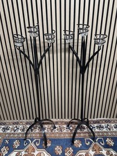 A Pair Or Black Metal Floor