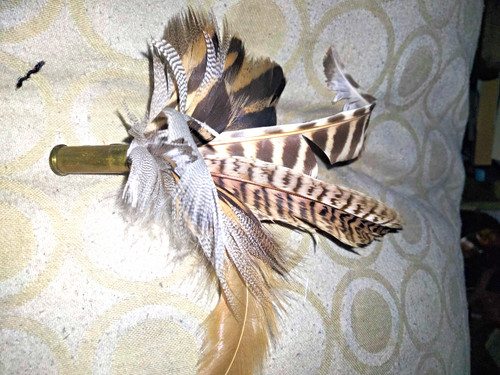 Handmade feather hunting horn