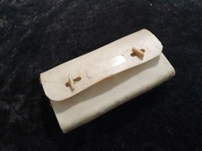 Vintage white bicycle saddle