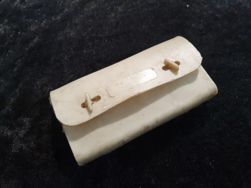 Vintage white bicycle saddle