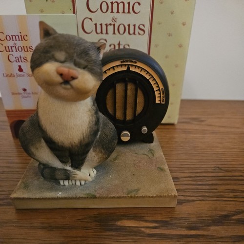 Comic curious cats the - &, "the