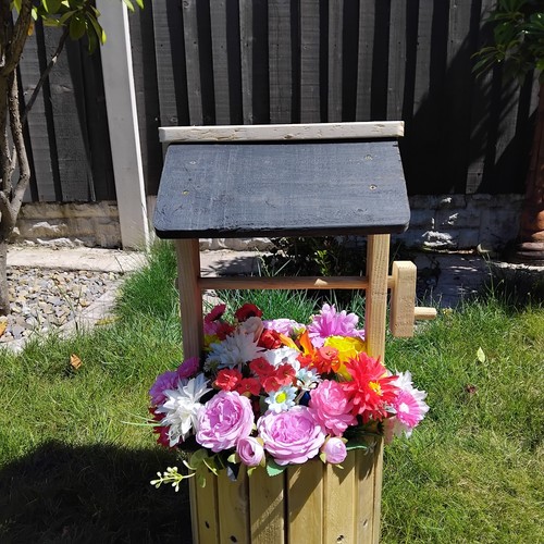 Lovely wooden wishing well - lovely,