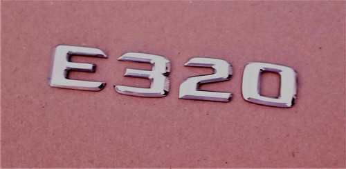 Mercedes e320 trunk - mercedes, emblems