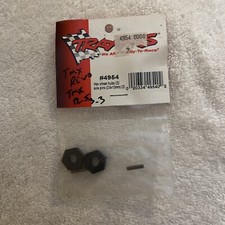 TRA4954  Wheel hubs, hex (2)/ axle pins (2.5x12mm) (2) -