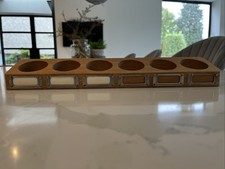 Jme by Jamie Oliver.  The Line Up Oak Spice Rack For 6 Jars can be Wall Mounted