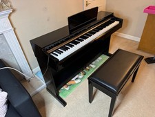 Yamaha YDP-162PE (Polished Ebony) digital upright piano from the Yamaha Arius
