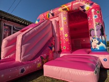 Commercial bouncy castle with slide