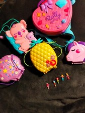 LARGE POLLY POCKET BUNDLE X5 SETS BAGS PLUS 5 FIGURES SOLD AS SEEN