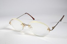 Silhouette Eyeglasses 7219 Womens Gold 6050 Rimless Titanium Glasses Frames