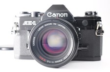**NEAR MINT-** Canon AE-1 SLR