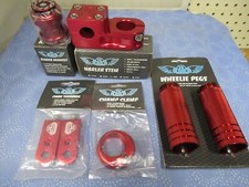 SE Bikes BMX Mix Lot-Pegs, Narler, Eluder Headset, Champ Clamp, Tensioner-Red