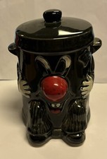 Vintage Dusty Bin Money Box. Good Condition Height 15cm