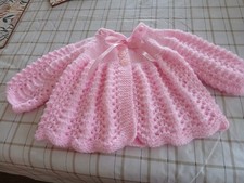 hand knitted matinee coat in