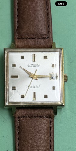 Sandoz - , )