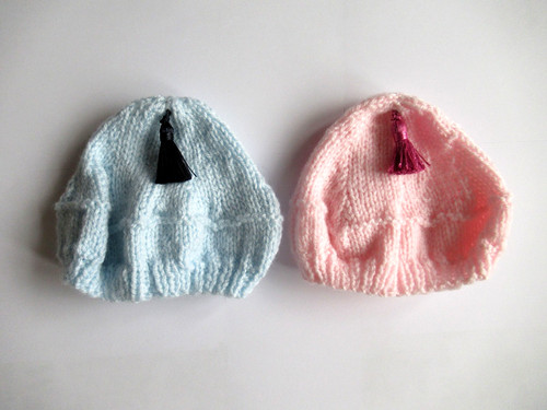 Handknitted pale pink and - handknitted,