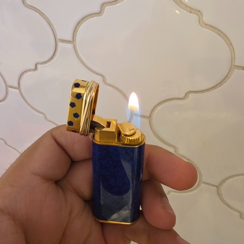 Must cartier lighter - a,