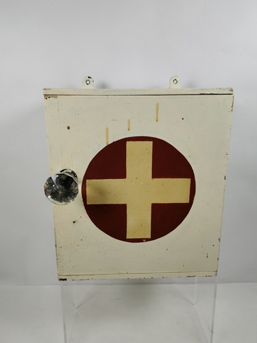 Vintage wooden first aid - first,