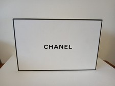 CHANEL gift box with two drawstring bags and tissue paper