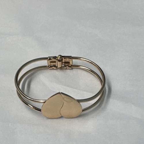 Gold tone double heart bangle - double,