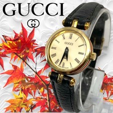 GUCCI Sheer Line Gold Round Quartz Watch Roman Dial Black Leather 22mm